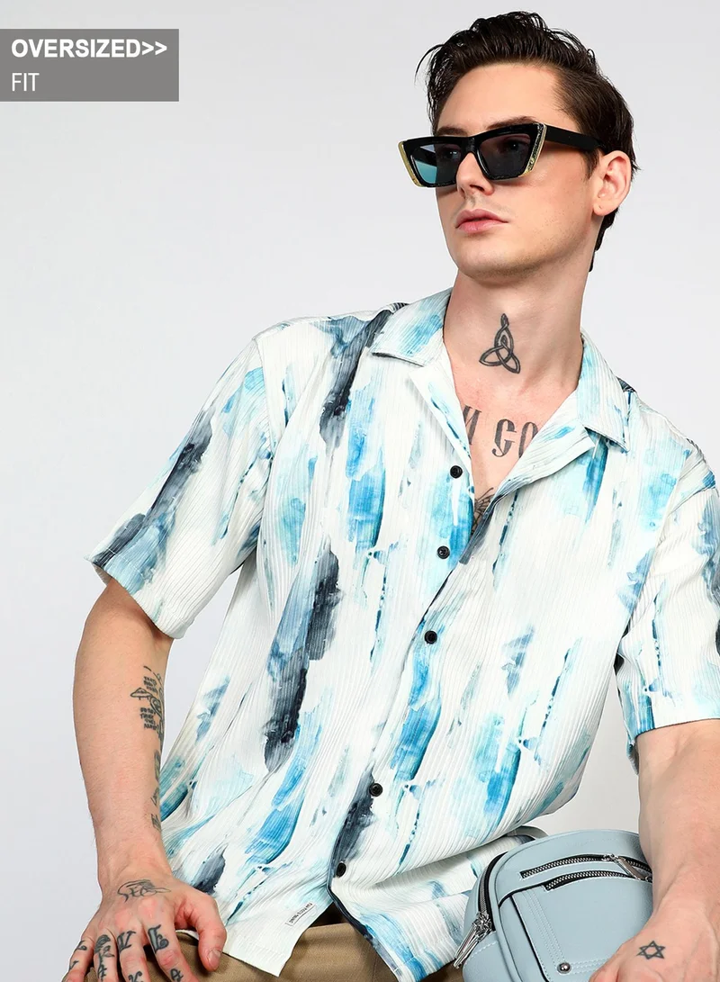 Campus Sutra Campus Sutra Men's Sky Blue Oversized Water Strokes Shirt For Casual Wear | Cuban Collar | Short Sleeve | Button Closure | Shirt Crafted With Comfort Fit For Everyday Wear