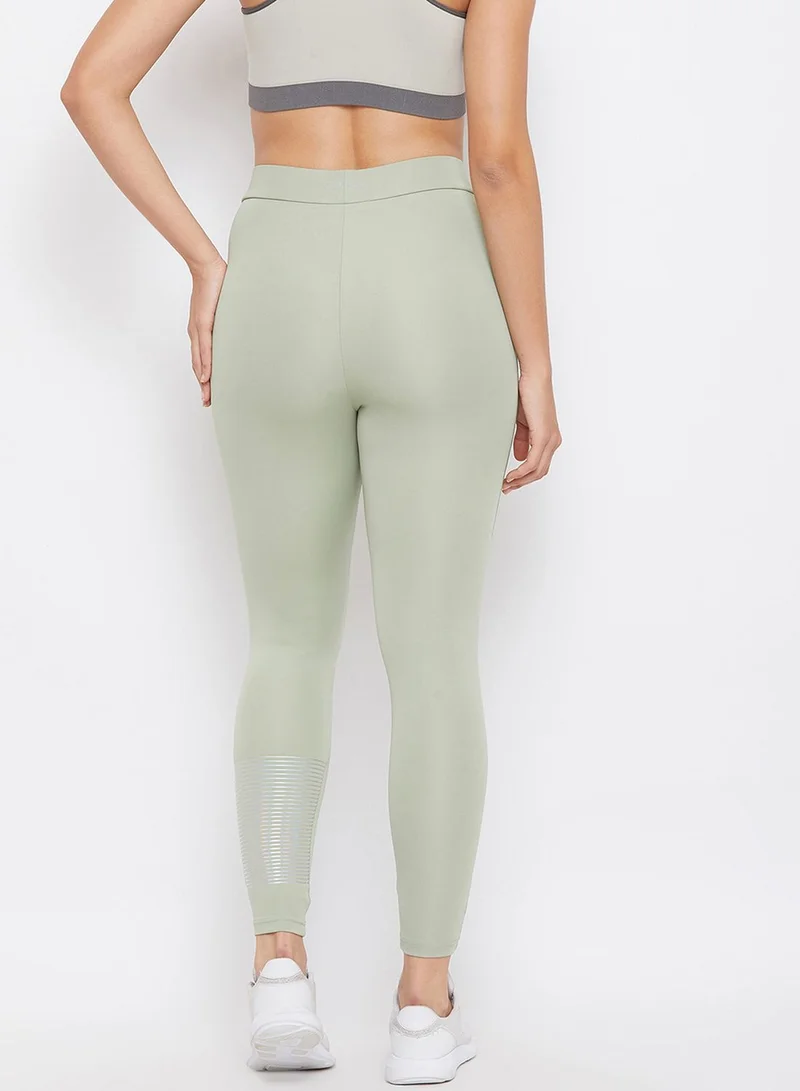 Clovia Snug Fit Active Ankle-Length Tights  with Reflector Stripes