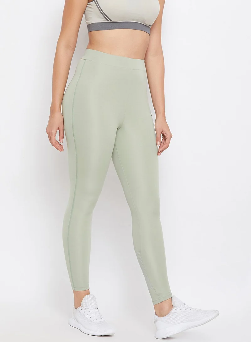 Clovia Snug Fit Active Ankle-Length Tights  with Reflector Stripes