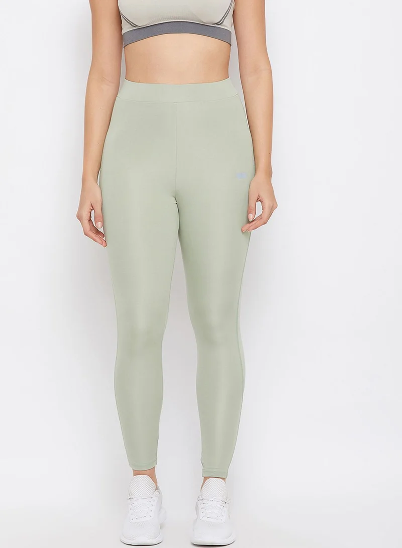 Clovia Snug Fit Active Ankle-Length Tights  with Reflector Stripes