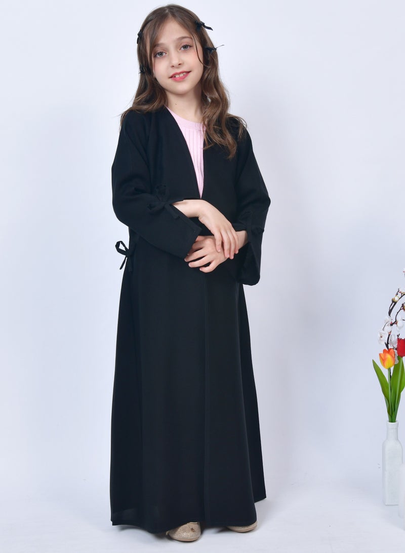 HAWRAA ABAYA Girls' black quarter-length abaya decorated with a bow - Image 1