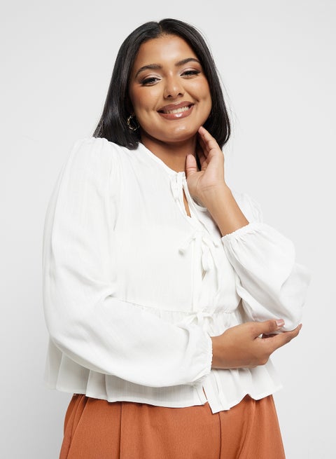 بلوزة بيبلوم بربطة عنق فراشة