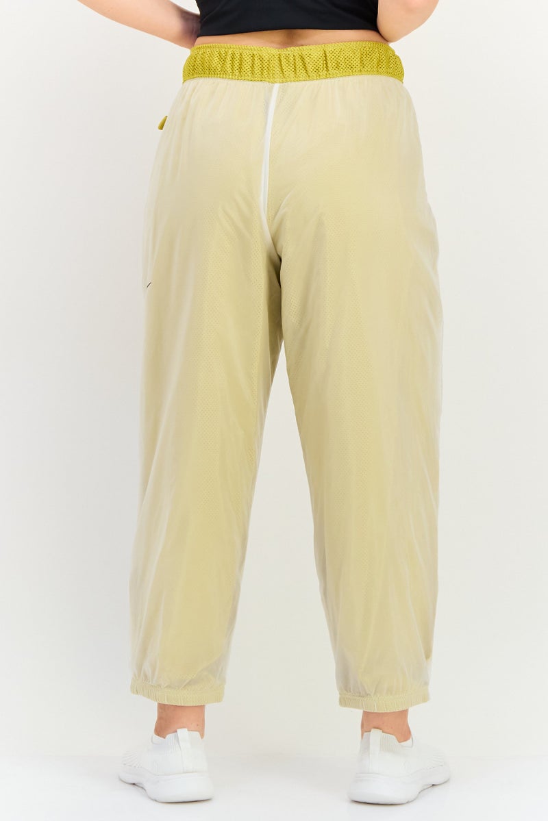 Nike سروال تدريب فضفاض للنساء، أصفر - Image 3