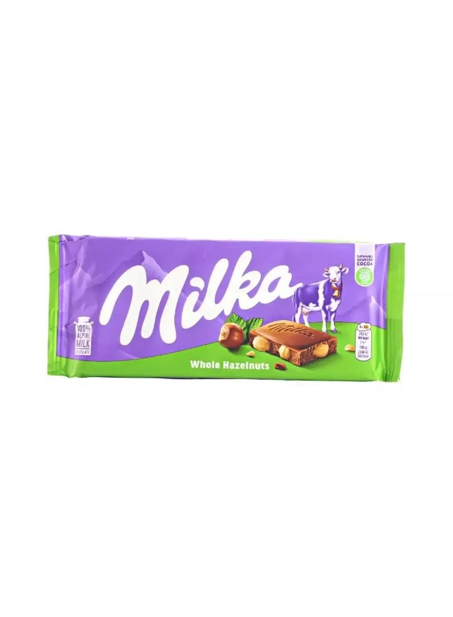 Milka Whole Hazelnut Alpine Milk Chocolate Bar- 100gms - Image 1