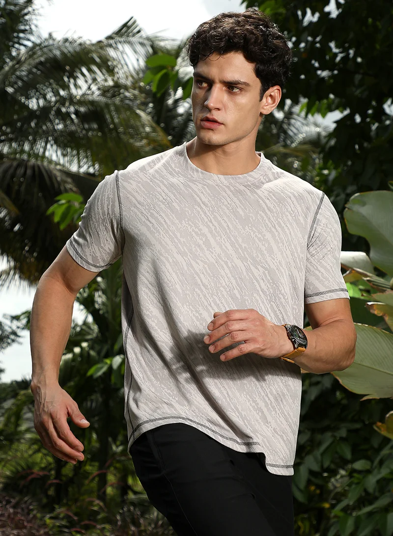 Campus Sutra Campus Sutra Men's Cloud Grey Plash-Imprint Activewear T-Shirt For Casual Wear | Round Neck | Short Regular Sleeves | Pull On Closure | Jersey T-Shirt Crafted With Comfort Fit For Everyday Wear