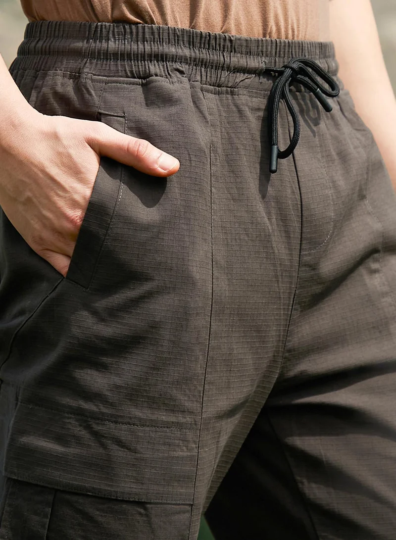Campus Sutra Men's Umber Brown Solid Utility Trousers