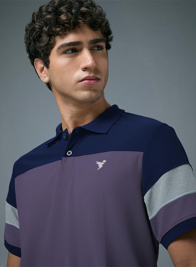تكنوسبورت بولو بيكيه بقصة ضيقة ونمط كتل الالوان - Image 3