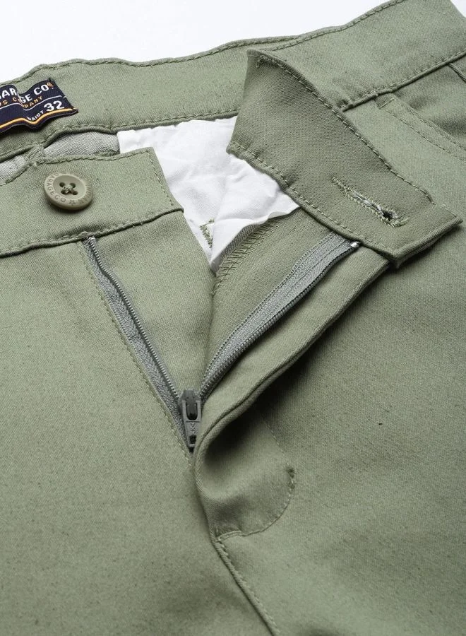 شركة المرآب الهندية Men Slim Fit Solid Mid-Rise Stretchable Chinos