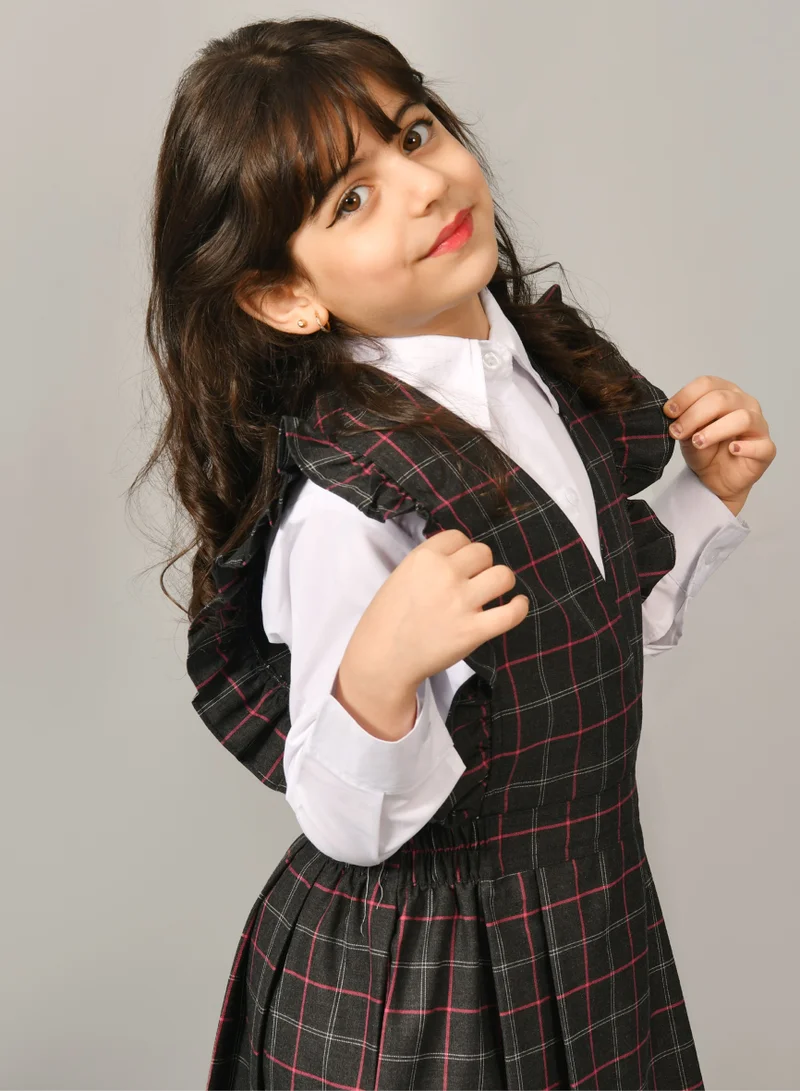 HAWRAA ABAYA Black checkered kindergarten apron with ruffles, a gathered waist, and side pleats - apron only