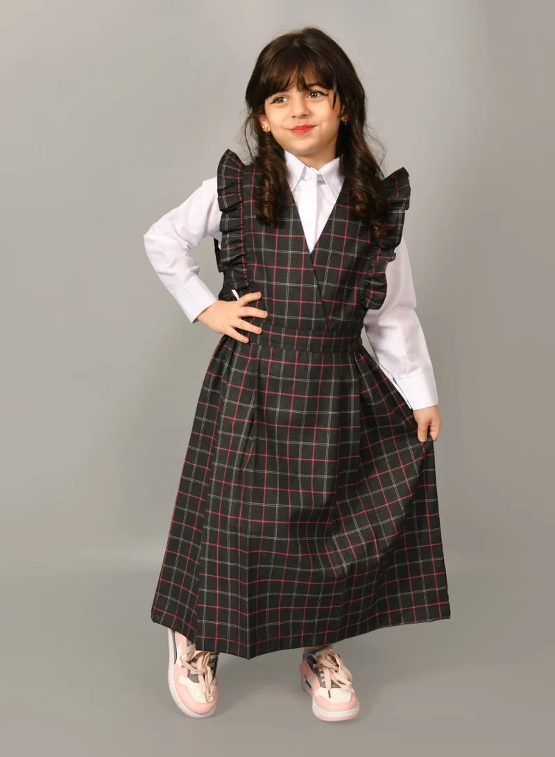 HAWRAA ABAYA Black checkered kindergarten apron with ruffles, a gathered waist, and side pleats - apron only