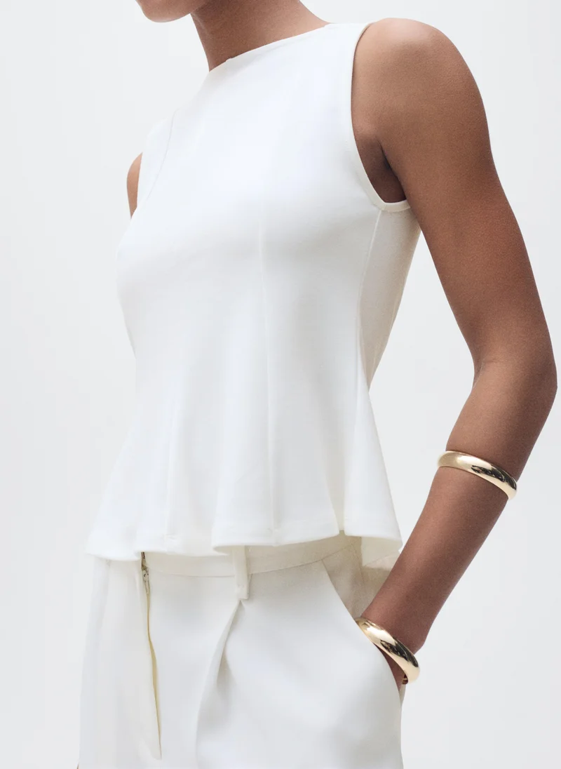 MANGO Peplum top with seam detail