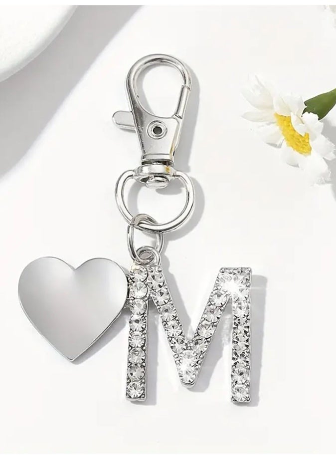 Silver keychain with sparkling crystal design featuring  heart-shaped keyring and the letter M suitable for keys and bags - Image 1