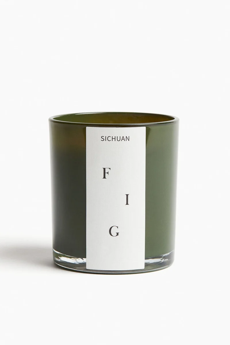 اتش اند ام Scented candle in a glass holder