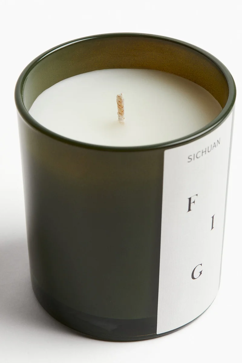 اتش اند ام Scented candle in a glass holder
