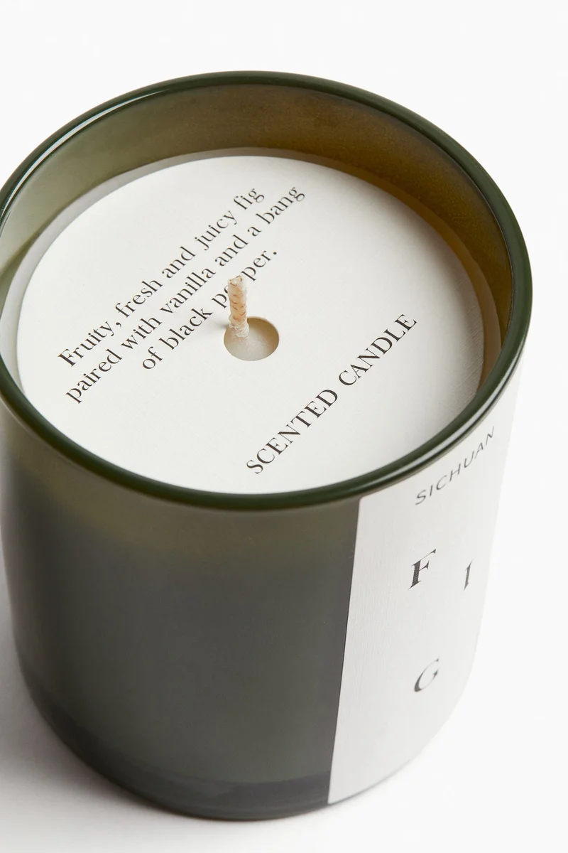 اتش اند ام Scented candle in a glass holder