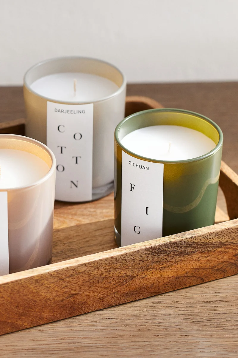 اتش اند ام Scented candle in a glass holder