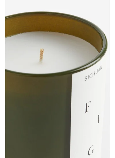 اتش اند ام Scented candle in a glass holder