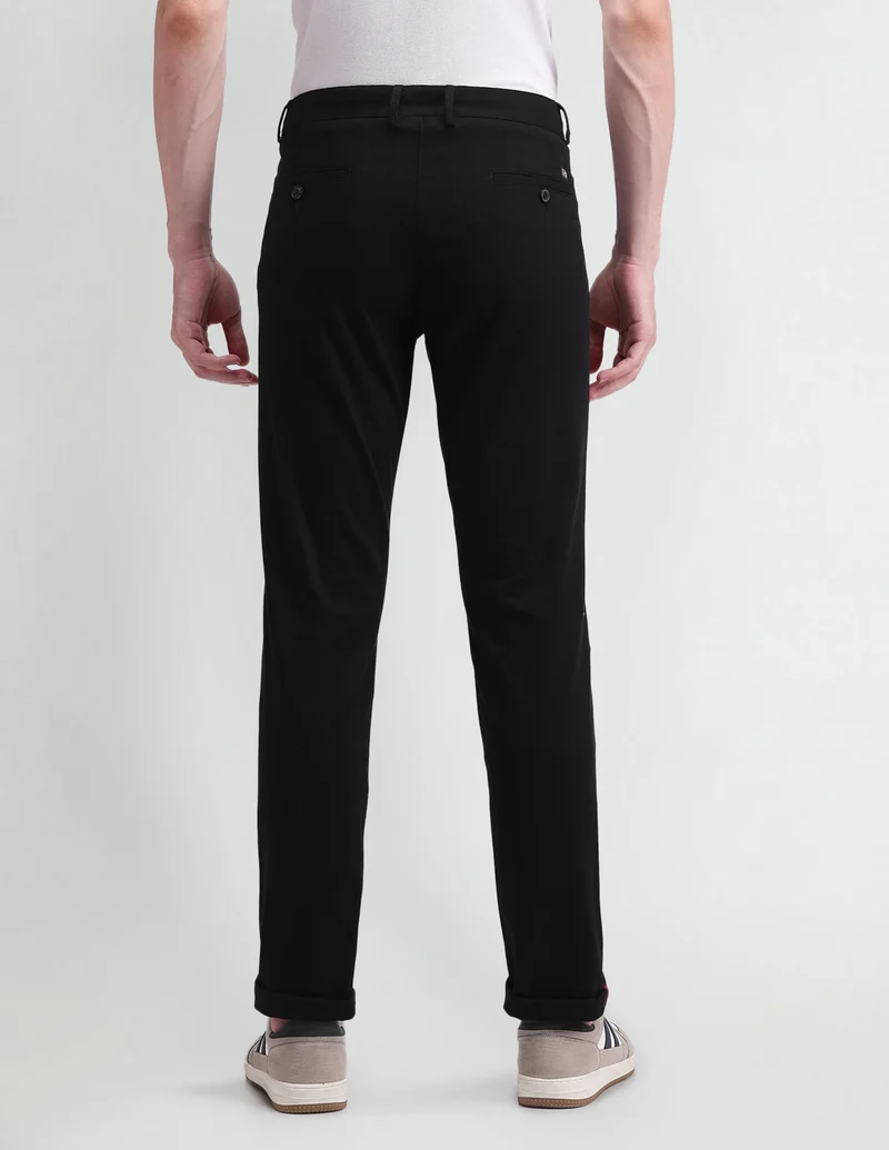Arrow Black Slim Fit Dobby Trousers for Men | Best Price UAE