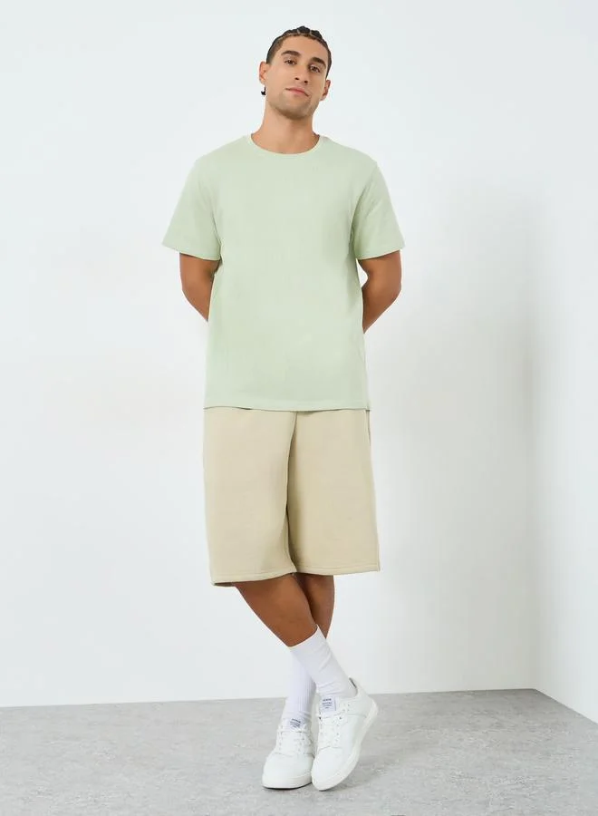 Styli Men Green Graphic Print Crew Neck T-Shirt