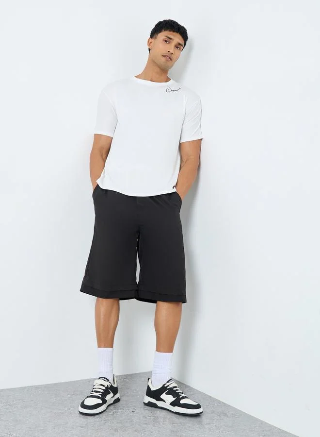 ستايلي Styli Men Black Oversized Solid Shorts with Drawstring