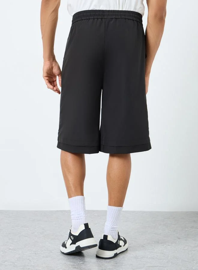 Styli Styli Men Black Oversized Solid Shorts with Drawstring