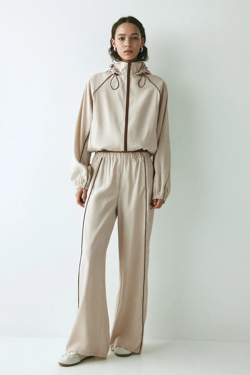 اتش اند ام جاكيت واقٍ من الرياح فضفاض