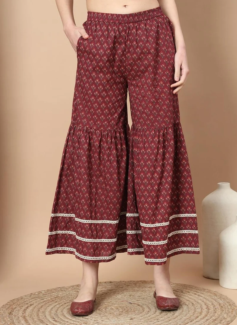 زيري سوق This is a Maroon printed Kurta with Sharara with dupatta