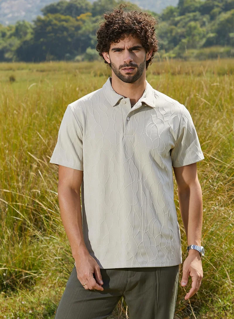 كامبوس سوترا تيشيرت بولو رجالي كريمي بنقوش عروق لمسية