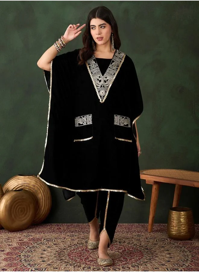 ISHIN Elastic Women Black Velvet Kurta Set with Embroidered pattern Tunic and Palazzo features a Round neckline and Three-Fourth Sleeve secured with Elastic closure and styled in Straight Fit ideal for Festive moments — designed to make heads turn.