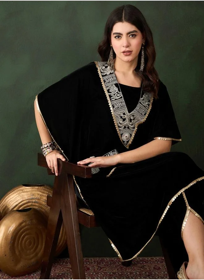 آي شين Elastic Women Black Velvet Kurta Set with Embroidered pattern Tunic and Palazzo features a Round neckline and Three-Fourth Sleeve secured with Elastic closure and styled in Straight Fit ideal for Festive moments — designed to make heads turn.