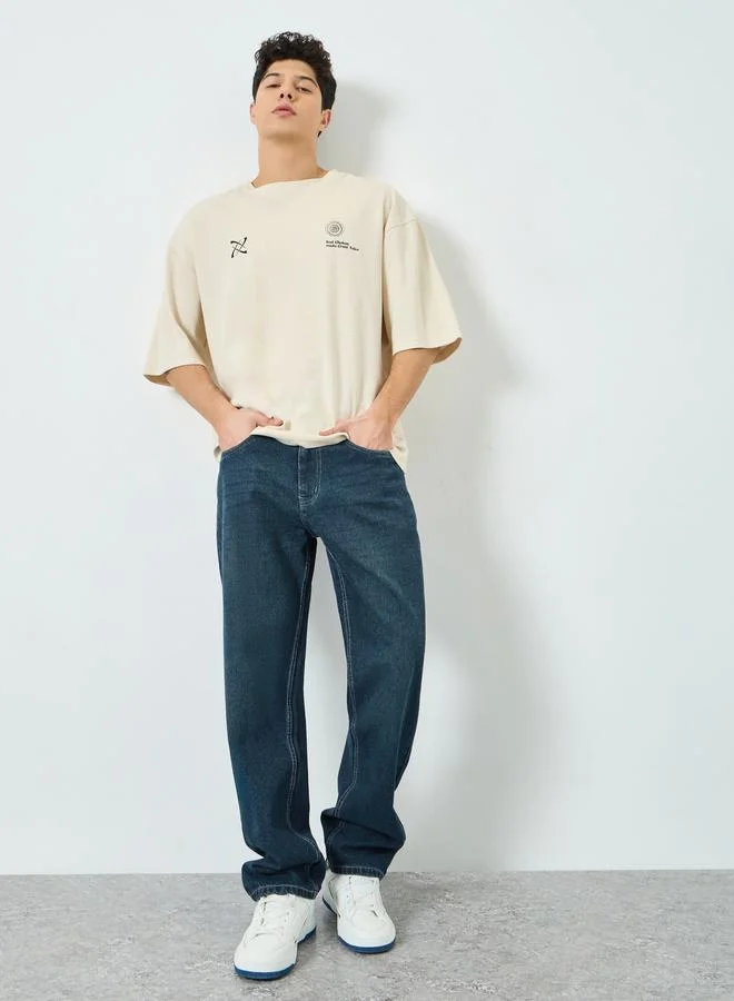 Styli Men Blue Panelled Relaxed Fit Jeans with Tonal Contrast Stitch and Mild Tinting