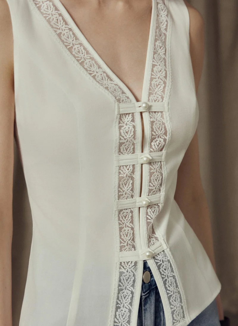 Lichi  Top with lace detailing and pearlescent buttons for Women | Best Price UAE