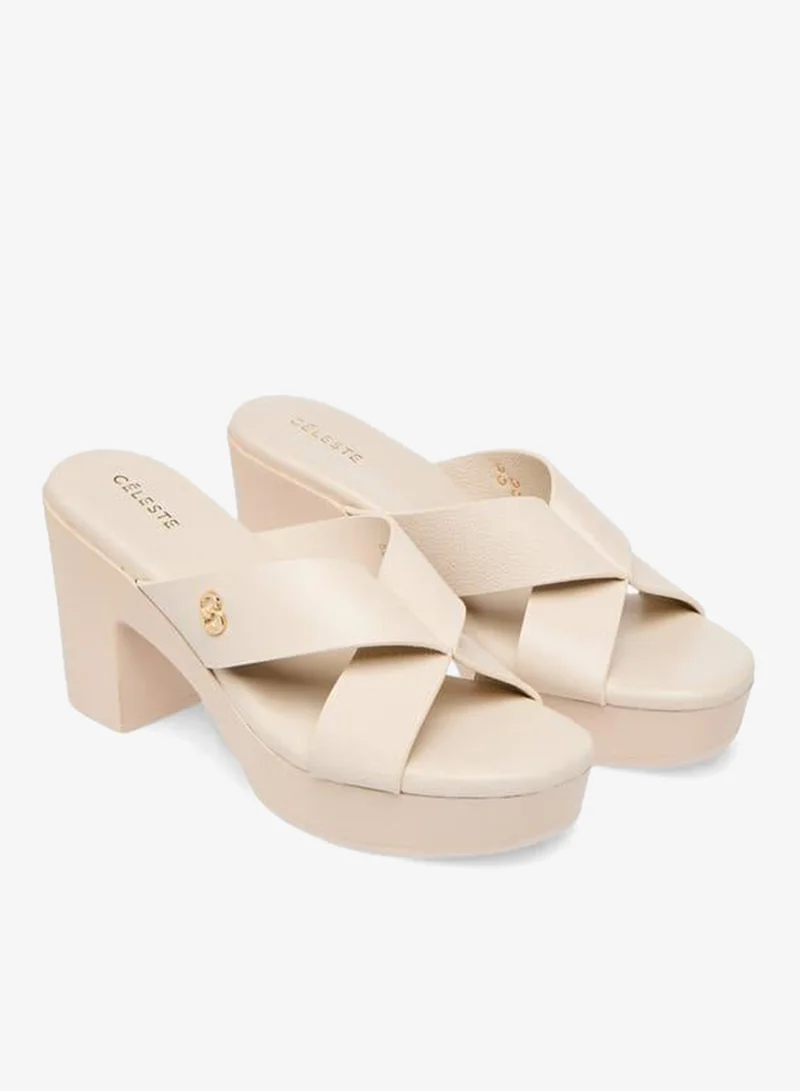 سيليست صنادل نسائية بكعب عريض وحزام متقاطع بشعار