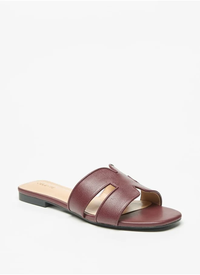 سيليست Womens Textured Slip-On Flat Sandals