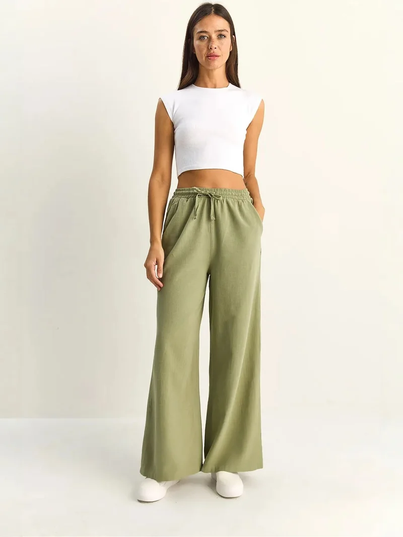 بيانكو لوتشي LUCCI Wide Leg Cotton Trousers with Drawstring Waist
