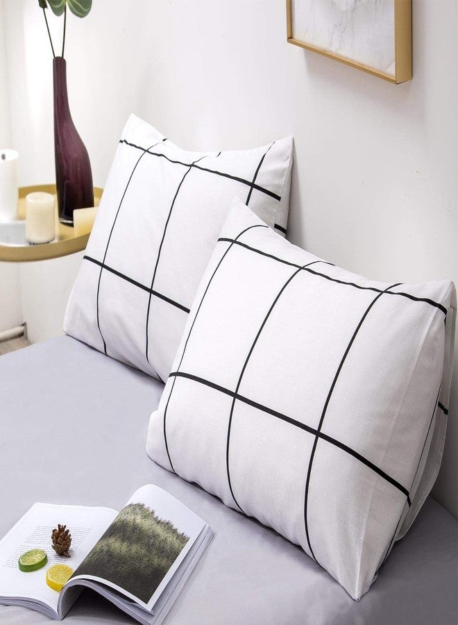 KAREVER White Grid Pillowcases 2 Packs Black White Plaid Pillow Covers Large Lattice Envelope Pillow Shams for Boys Girls Teens Adult White Checkered Bed Pillow Pillowcases Standard 20"x26" - Image 1