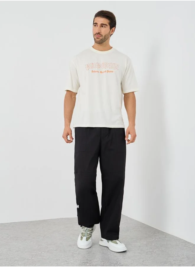 Styli Styli Slogan Print Crew Neck Oversized T-Shirt