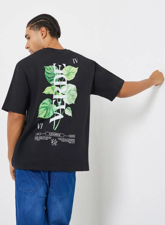 Styli Men Black Oversized Graphic Print Jersey T-Shirt