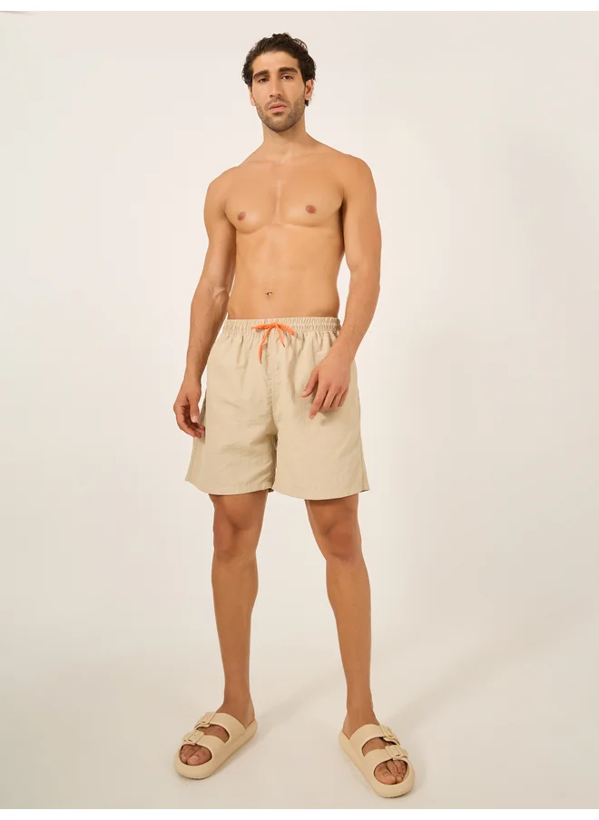 ستايلي Styli Solid Contrast Drawstring Swim Shorts