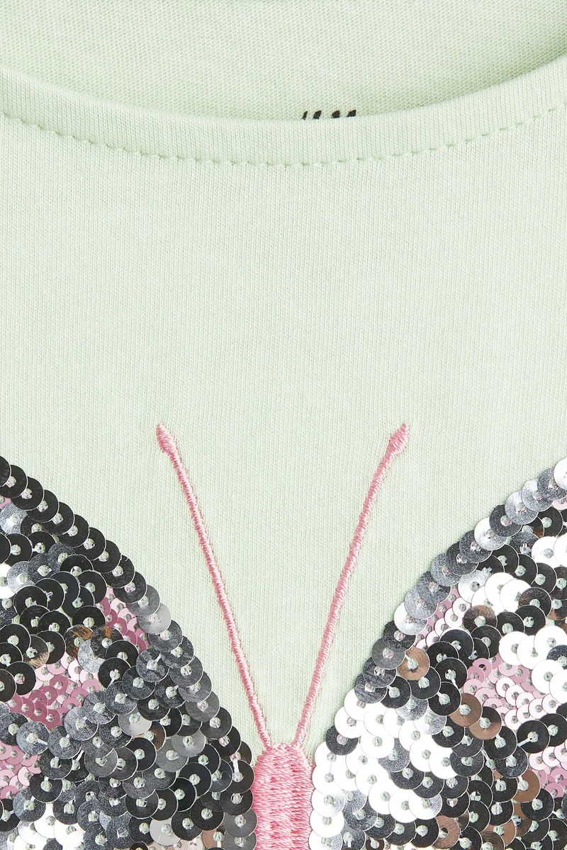 اتش اند ام بلوزة مزينة بترتر لامع