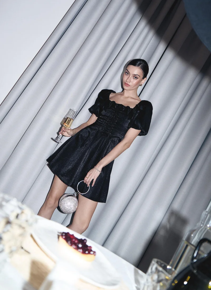 Lichi  Shiny mini dress with lace-up waistline for Women | Best Price UAE