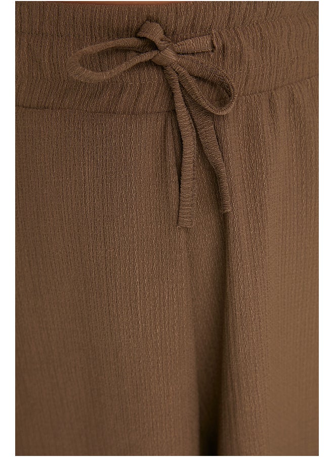 trendyol - Mink Relaxed Fit Normal Waist Crescent Knitted Shorts TWOSS22SR0212 - Image 1