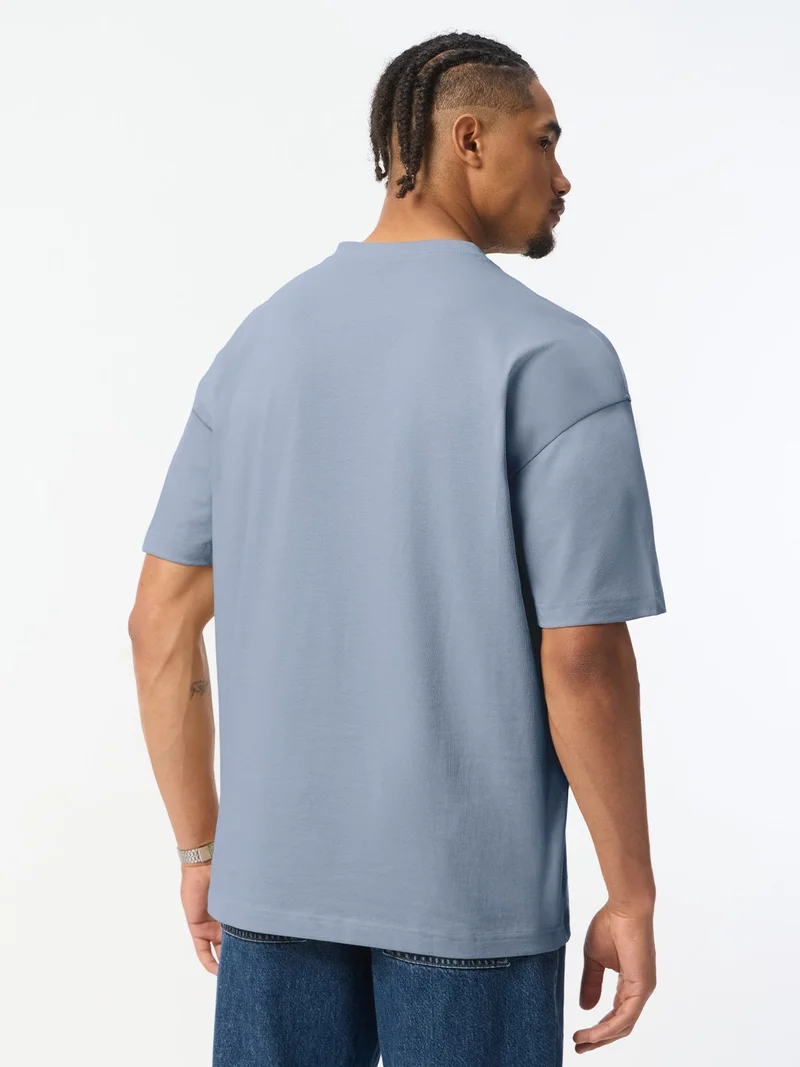 The Souled Store  The Souled Store: Marine Men and Boys Short Sleeve Y-Neck Henley Light Slate Grey Solid Textured Cotton Oversized Fit Heavy Gauge Fabric Polo Shirts  | Best Price UAE