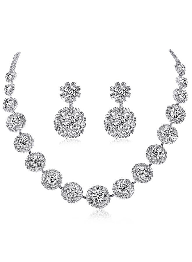 مجموعة مجوهرات من قطعتين تشمل عقد وأقراط بتصميم لامع بقطع الماس الدائرية وزخرفة ماسية أنيقة لمجموعة المجوهرات للنساء، هدية لصديقتك أو زوجتك أو والدتك أو وصيفات العروس لمناسبة الزفاف والاحتفالات. - Image 2