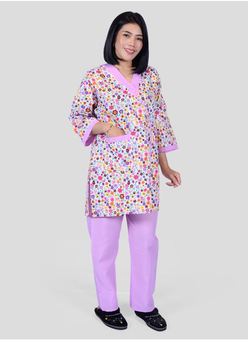 Generic A pink domestic worker uniform with a floral pattern  - Image 1