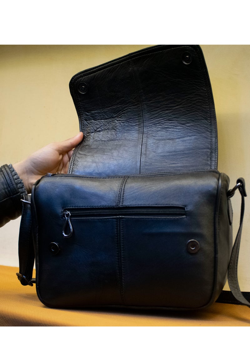 📌 Black Leather Crossbody Bag – Elegant & Functional 👜 Size: 30×25×10 cm 🖤 Color: Classic black – perfect for any outfit 💼 Made from 100% genuine leather – handcrafted quality 🔐 2 outer zippers + 1 hidden magic zipper + 3 inner compartments + handle + crossbody strap  ✔️ Spacious, stylish & super practical ✔️ Great for daily wear, work, or outings ✔️ From Holy of Holies Store  📦 Available now – Shipping all over Egypt - Image 3