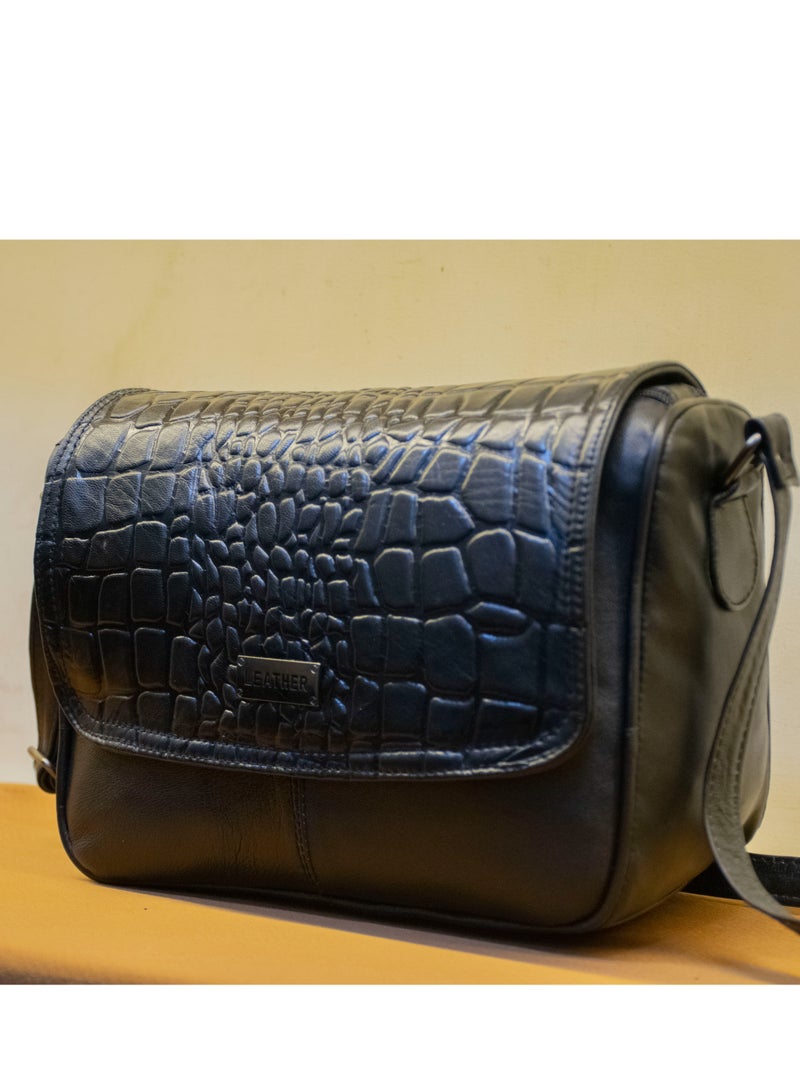 📌 Black Leather Crossbody Bag – Elegant & Functional 👜 Size: 30×25×10 cm 🖤 Color: Classic black – perfect for any outfit 💼 Made from 100% genuine leather – handcrafted quality 🔐 2 outer zippers + 1 hidden magic zipper + 3 inner compartments + handle + crossbody strap  ✔️ Spacious, stylish & super practical ✔️ Great for daily wear, work, or outings ✔️ From Holy of Holies Store  📦 Available now – Shipping all over Egypt - Image 1