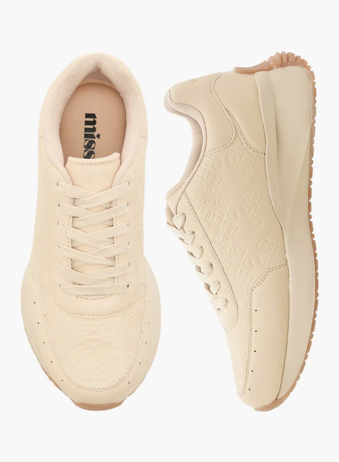 ميسي Women's Monogram Embossed Lace-Up Sneakers