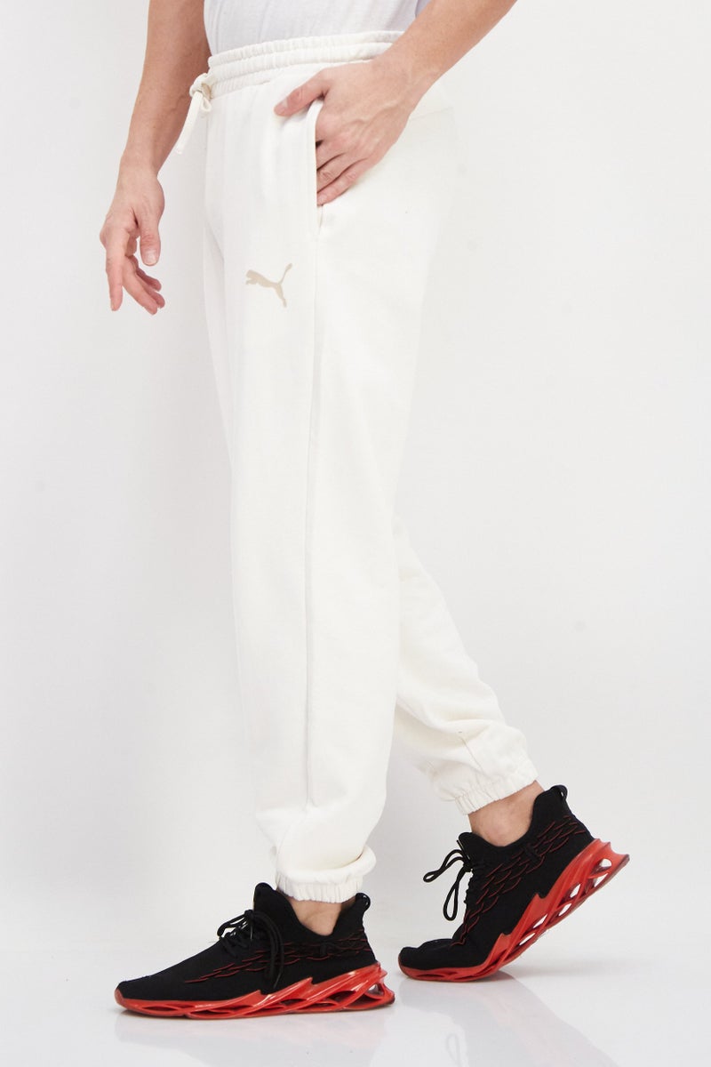 PUMA Men Sportswear Fit Brand Logo Training Sweatpants, Cream - Image 2