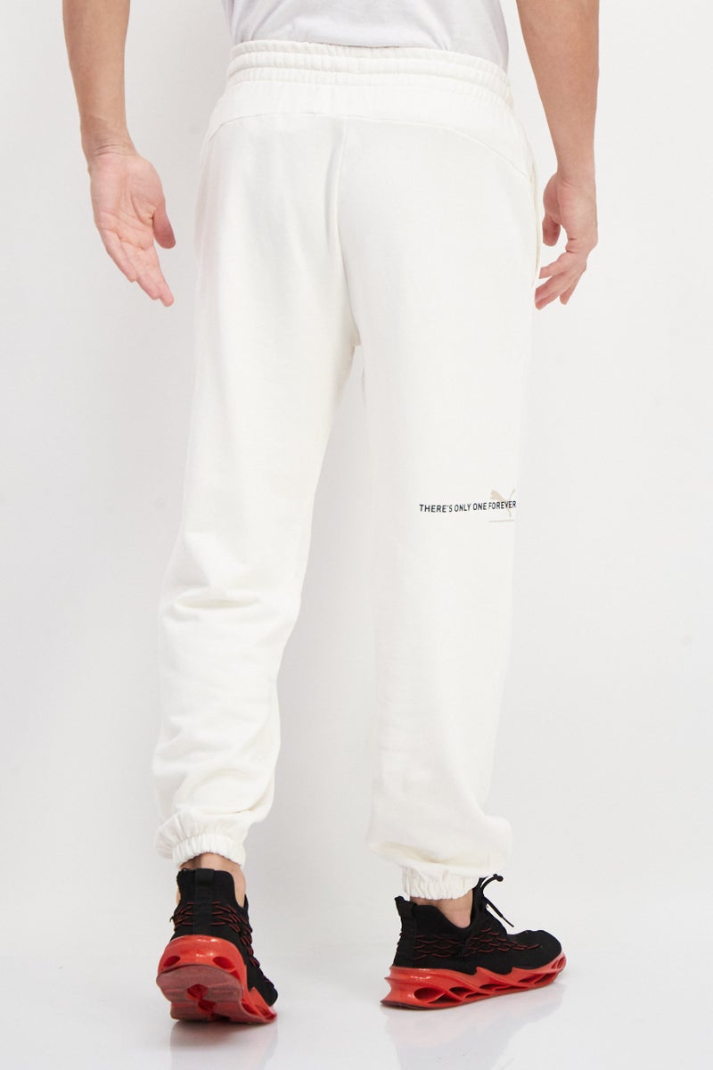 PUMA Men Sportswear Fit Brand Logo Training Sweatpants, Cream - Image 4
